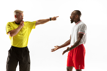 Image showing Football referee gives directions with gestures to players isolated on white background