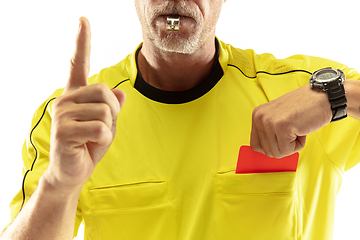 Image showing Football referee showing a red card to a displeased player isolated on white background