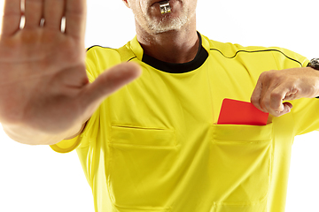 Image showing Football referee showing a red card to a displeased player isolated on white background