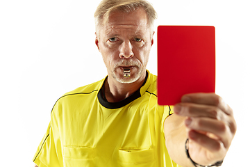 Image showing Football referee showing a red card to a displeased player isolated on white background
