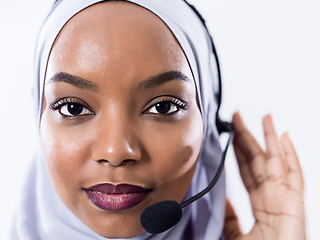 Image showing african customer representative business woman with phone headse