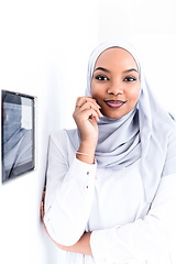 Image showing african woman using smart home screen