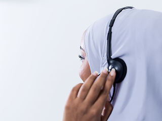 Image showing african customer representative business woman with phone headse