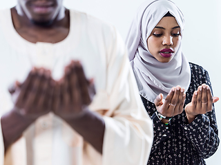 Image showing african muslim couple praying