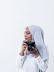 Image showing african modern muslim woman using retro camera