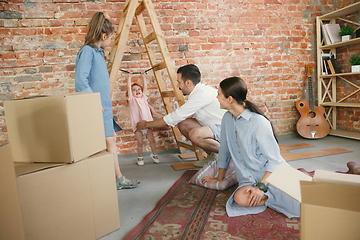 Image showing Adult family moved to a new house or apartment