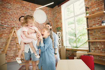 Image showing Adult family moved to a new house or apartment