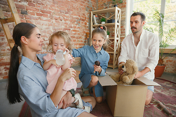 Image showing Adult family moved to a new house or apartment