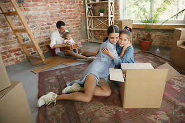 Image showing Adult family moved to a new house or apartment