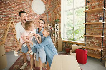 Image showing Adult family moved to a new house or apartment