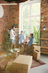 Image showing Adult family moved to a new house or apartment