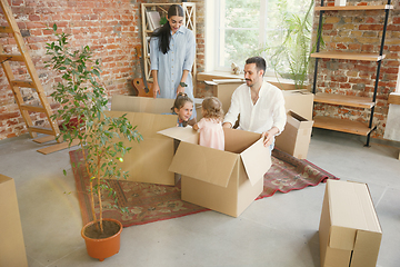 Image showing Adult family moved to a new house or apartment