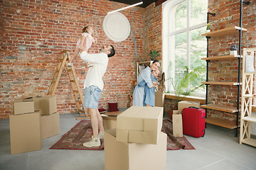 Image showing Adult family moved to a new house or apartment