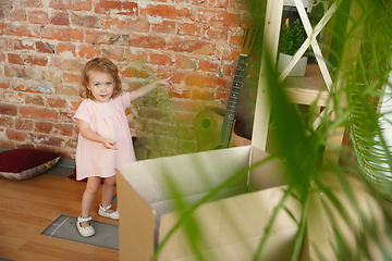 Image showing Little girl moved to a new house or apartment