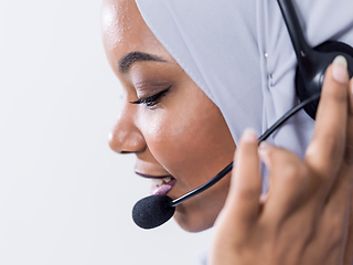 Image showing african customer representative business woman with phone headse