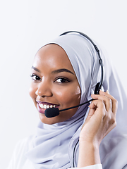 Image showing african customer representative business woman with phone headse