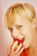 Image showing Girl with an apple