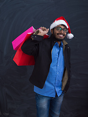 Image showing Indian Santa with shopping bags