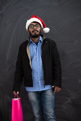 Image showing Indian Santa with shopping bags