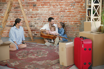 Image showing Adult family moved to a new house or apartment