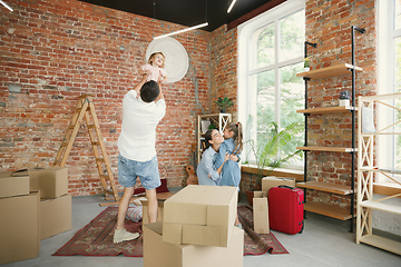 Image showing Adult family moved to a new house or apartment