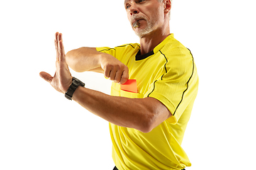 Image showing Football referee showing a red card to a displeased player isolated on white background