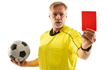 Image showing Football referee showing a red card to a displeased player isolated on white background