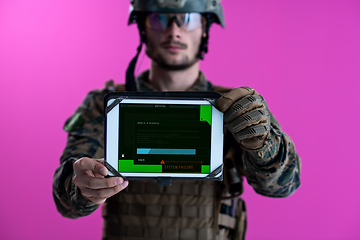 Image showing soldier showing a tablet with a blank green screen