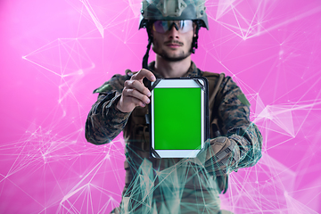 Image showing soldier showing a tablet with a blank green screen