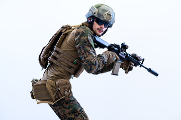 Image showing soldier in action aiming laseer sight optics