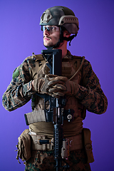 Image showing modern warfare soldier purple backgorund