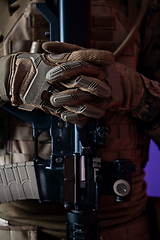 Image showing modern warfare soldier purple backgorund