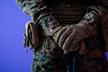 Image showing modern warfare soldier purple backgorund