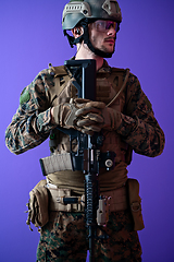 Image showing modern warfare soldier purple backgorund