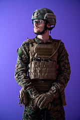 Image showing modern warfare soldier purple backgorund