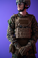 Image showing modern warfare soldier purple backgorund