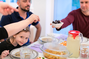 Image showing Eid Mubarak islamic family have Iftar dinner during Ramadan fest