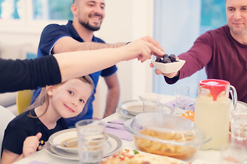 Image showing Eid Mubarak islamic family have Iftar dinner during Ramadan fest