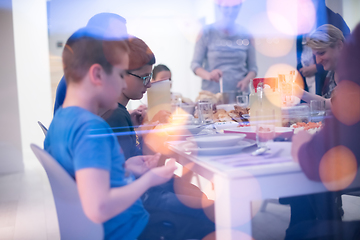 Image showing Eid Mubarak  Islamic family praying before halal Iftar dinner