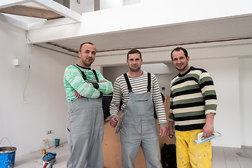 Image showing portrait of Workers and builders in apartment