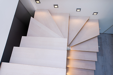 Image showing stylish interior with wooden stairs