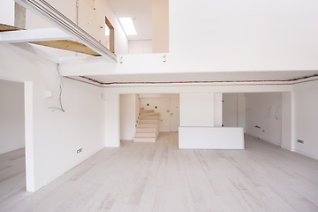 Image showing Interior of empty stylish modern open space two level apartment