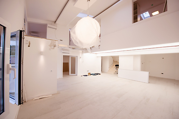 Image showing Interior of empty stylish modern open space two level apartment