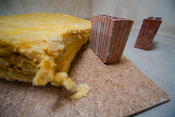 Image showing red Bricks and glass wool