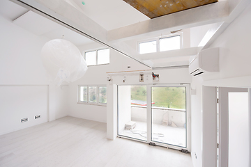 Image showing Interior of empty stylish modern open space two level apartment