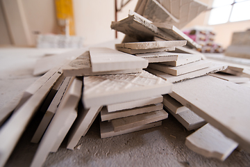 Image showing pile of ceramic wood effect tiles