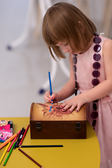 Image showing little girl painting jewelry box