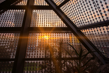 Image showing sunset through a glass roof