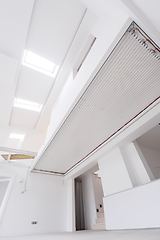 Image showing Interior of empty stylish modern open space two level apartment