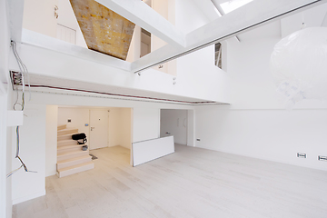 Image showing Interior of empty stylish modern open space two level apartment